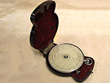 Rare 1920's Fowler's textile calculator with bakelite backplate and outer case